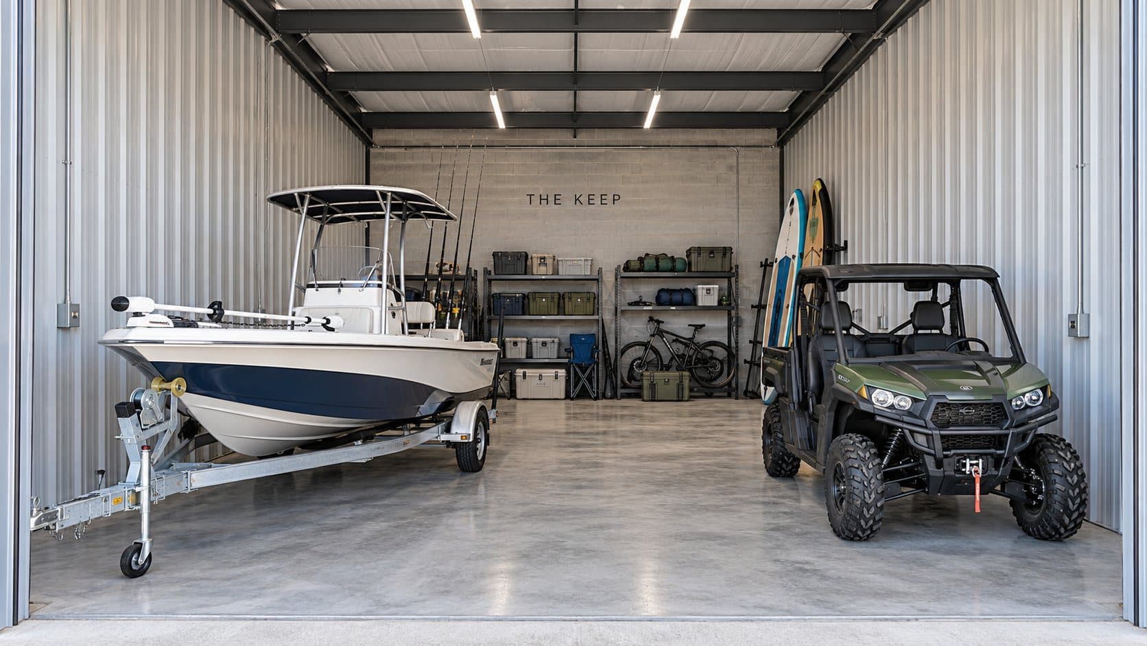 Artist's concept of a suite holding a fishing boat, a side-by-side, paddleboards, and gear shelving